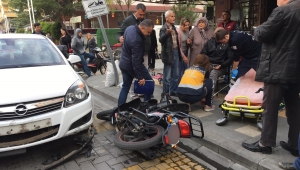 Dikkatsizce sollama yapan otomobil ile motosiklet çarpıştı: 1 yaralı