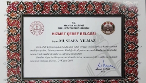 Manisa Valiliğinden Muhtar Yılmaz'a 'Hizmet Şeref Belgesi'