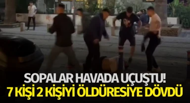 Sopalar havada uçuştu! 7 kişi 2 kişiyi öldüresiye dövdü