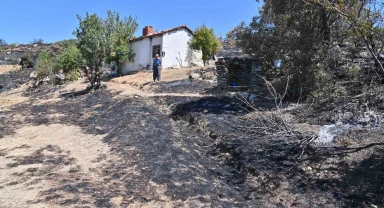 Büyükşehir'in dozerleri mahalleyi yanmaktan kurtardı