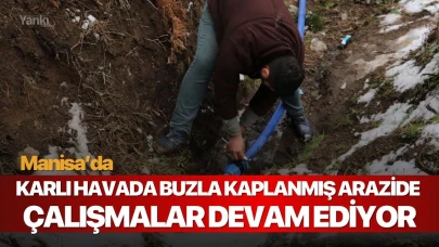 Manisa'da karlı havada buzla kaplanmış arazide çalışmalar devam ediyor